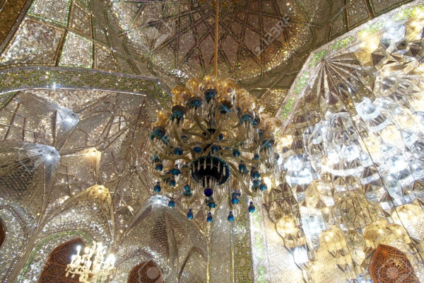 Architecture details in the mirrors room at the Shah Cheragh Mosque, Shiraz, Iran. The place is a funeral monument and mosque, housing the tombs of brothers Ahmad and Muhammad, sons of Musa al Khadim and brothers of Ali arl Ridha. The two took refuge during the Abbassid persecution of Shia Muslim. The tombs became the celebrate pilgrimage centres in 14th century when Queen Tashi Kathun erected a mosque and theological school in the vicinity.